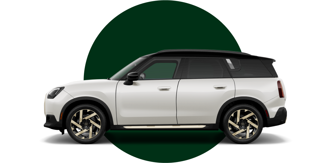Side view of a 2025 MINI Countryman SE ALL4 in the Nanuq White body color, facing left with its shadow underneath it