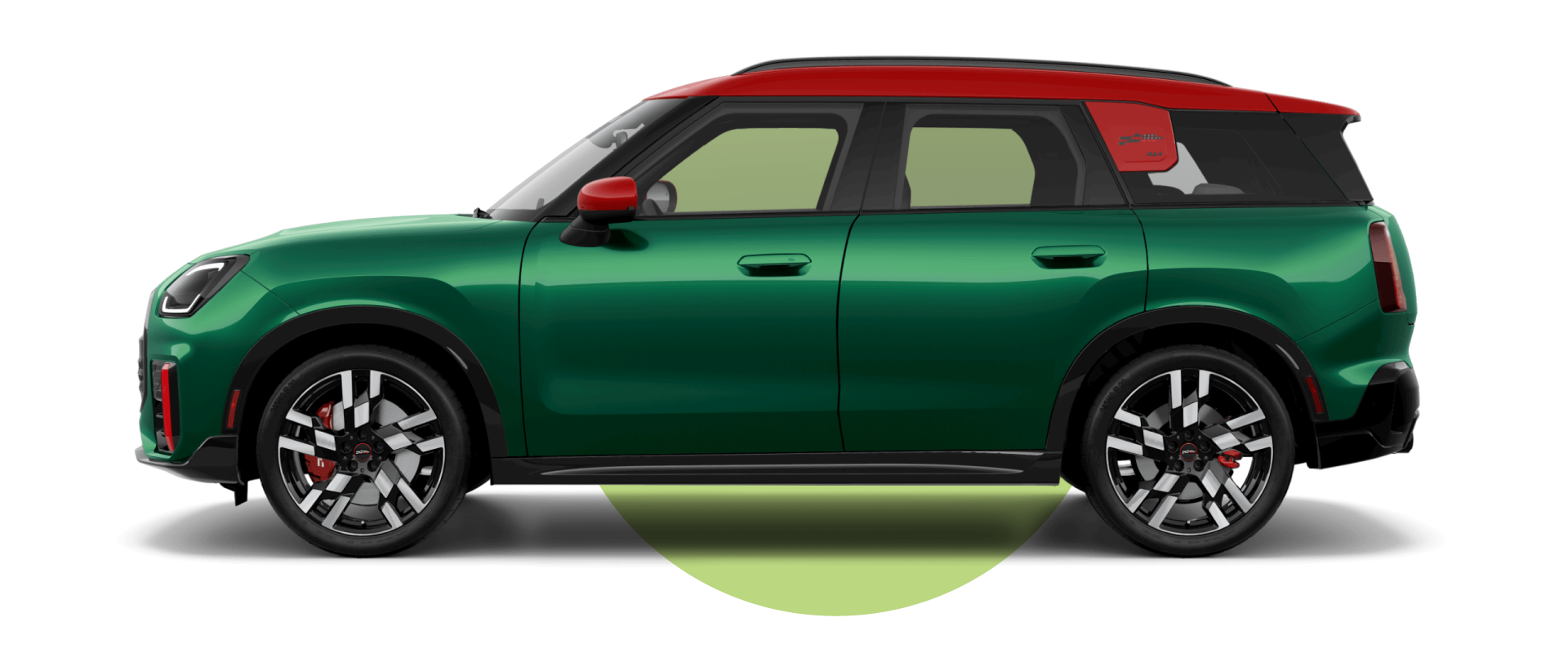 Side view of a MINI JCW Countryman ALL4 in the British Racing Green IV body color, facing left with its shadow underneath it.