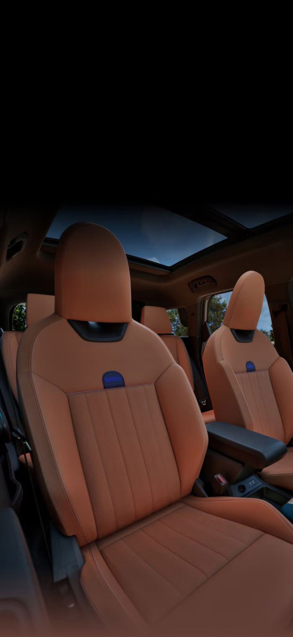 ountryman S ALL4 taken from the passenger's side showcasing the front Sports Seats with blue skies and trees out the windows.