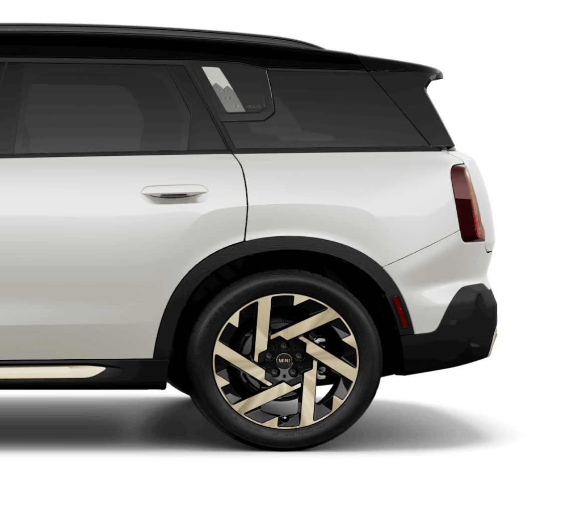 Side-view of a MINI Electric Hardtop 2 Door cropped from the driver's door to the trunk.