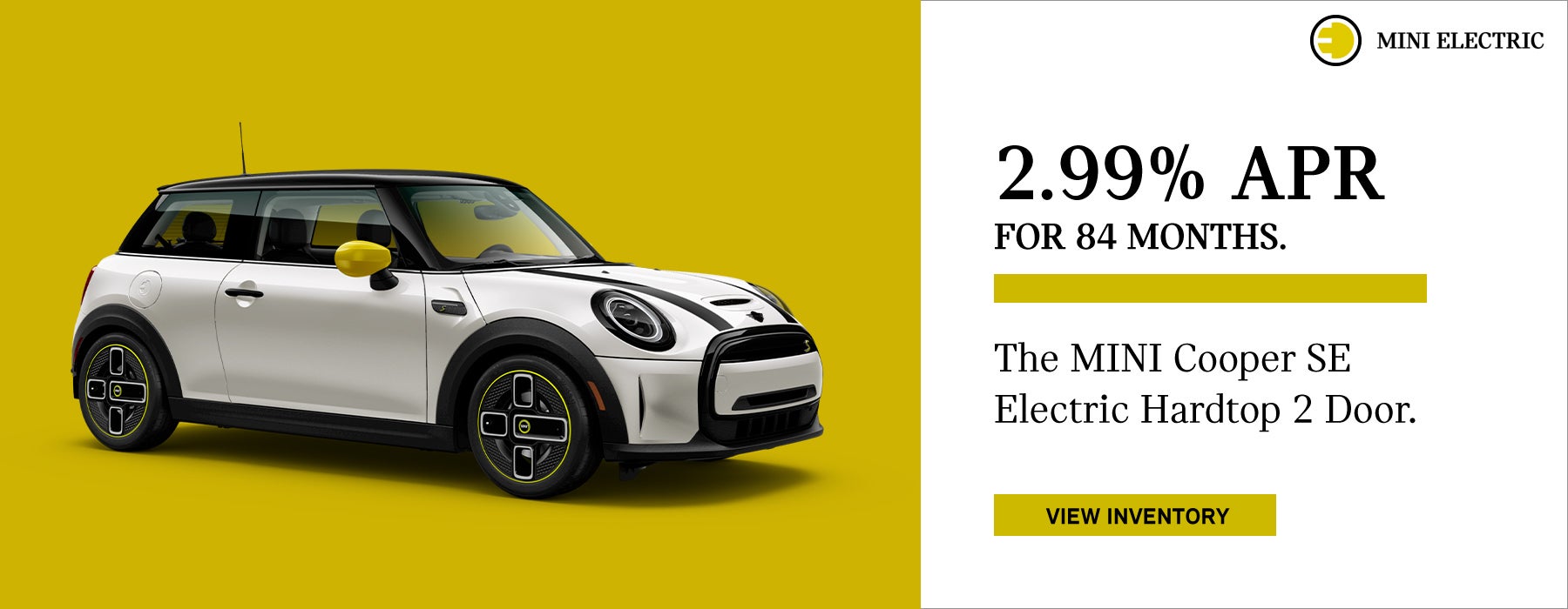 Right side view of MINI Electric on yellow background