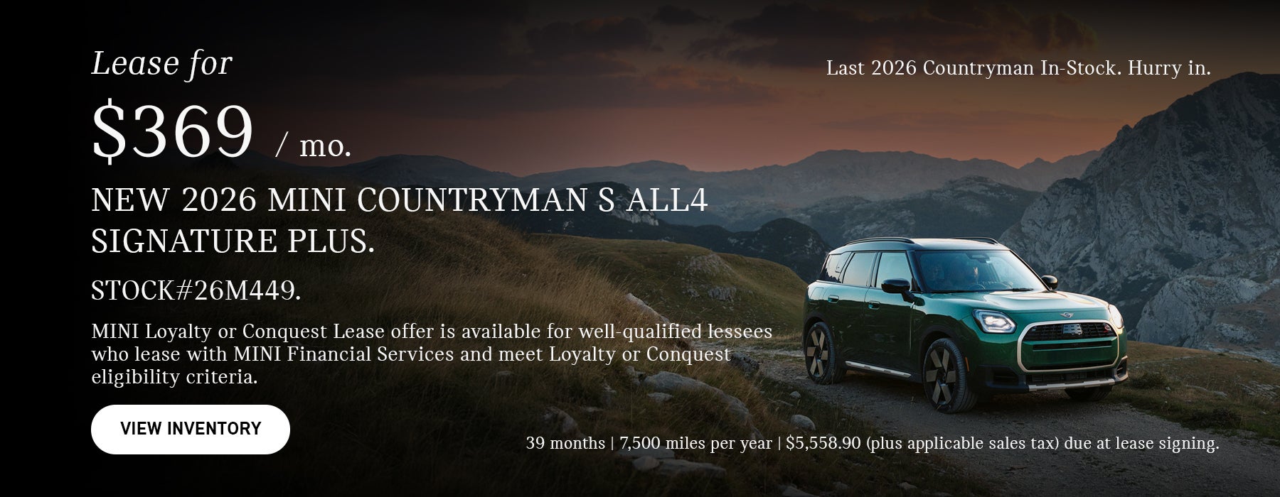Green countryman parked.