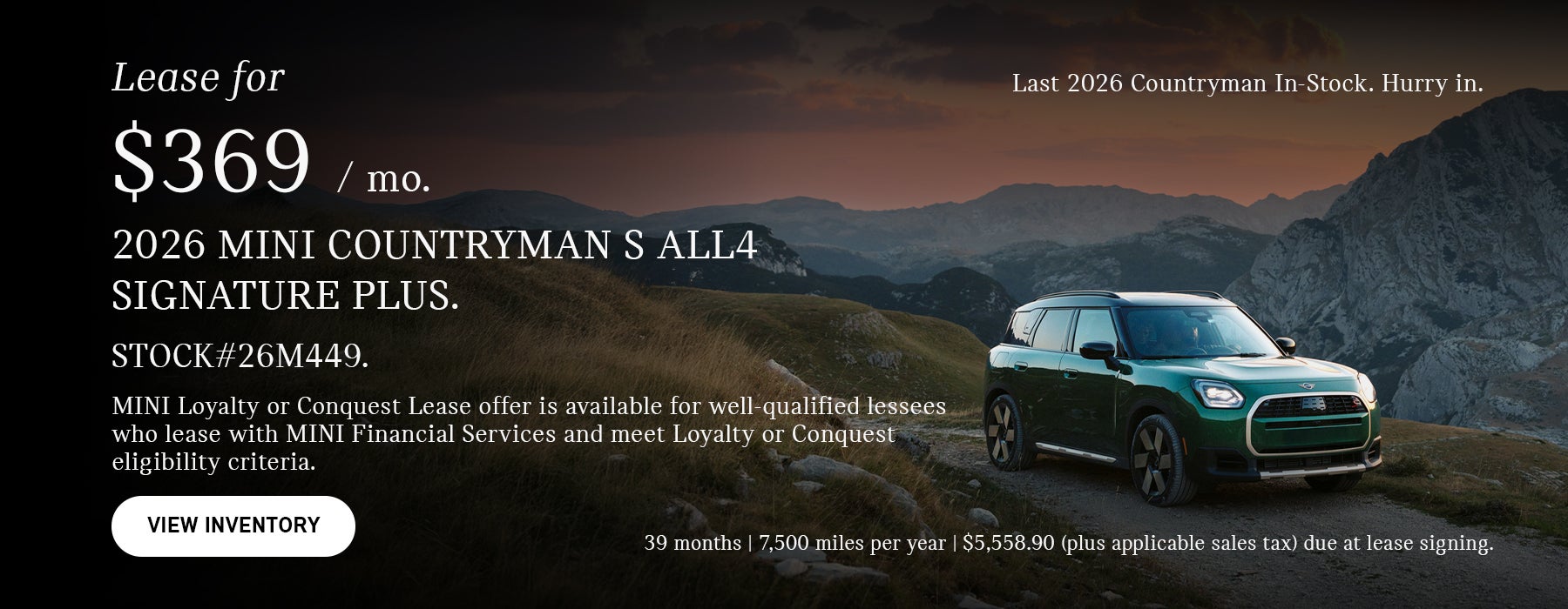 Green countryman parked.